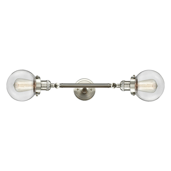 Beacon Bath Vanity Light shown in the Brushed Satin Nickel finish with a Clear shade
