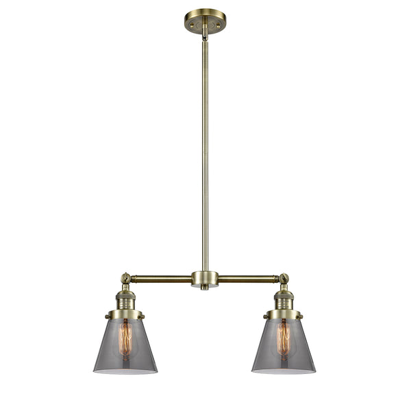 Cone Island Light shown in the Antique Brass finish with a Plated Smoke shade