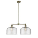 Bell Island Light shown in the Antique Brass finish with a Seedy shade