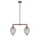 Geneseo Island Light shown in the Antique Copper finish with a Clear Crackled shade