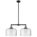 Bell Island Light shown in the Black Antique Brass finish with a Clear shade