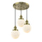 Beacon Multi-Pendant shown in the Antique Brass finish with a Matte White shade