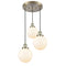 Beacon Multi-Pendant shown in the Antique Brass finish with a Matte White shade