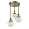 Beacon Multi-Pendant shown in the Antique Brass finish with a Clear shade