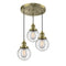 Beacon Multi-Pendant shown in the Antique Brass finish with a Seedy shade