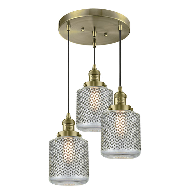 Stanton Multi-Pendant shown in the Antique Brass finish with a Clear Wire Mesh shade