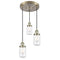 Dover Multi-Pendant shown in the Antique Brass finish with a Clear shade