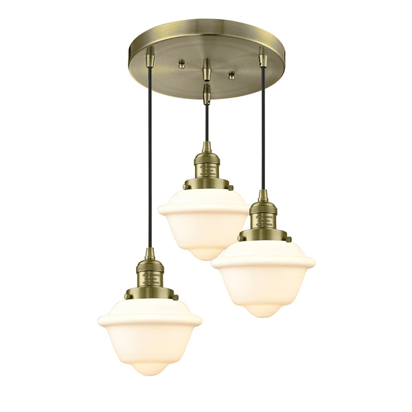 Oxford Multi-Pendant shown in the Antique Brass finish with a Matte White shade