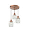 Colton Multi-Pendant shown in the Antique Copper finish with a Clear Halophane shade