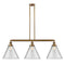 Cone Island Light shown in the Brushed Brass finish with a Clear shade