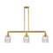 Colton Island Light shown in the Satin Gold finish with a Clear Halophane shade