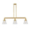 Cone Island Light shown in the Satin Gold finish with a Clear shade