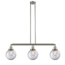 Beacon Island Light shown in the Brushed Satin Nickel finish with a Clear shade