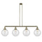 Beacon Island Light shown in the Antique Brass finish with a Seedy shade