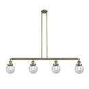 Beacon Island Light shown in the Antique Brass finish with a Seedy shade