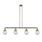 Beacon Island Light shown in the Antique Brass finish with a Seedy shade