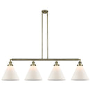 Cone Island Light shown in the Antique Brass finish with a Matte White shade