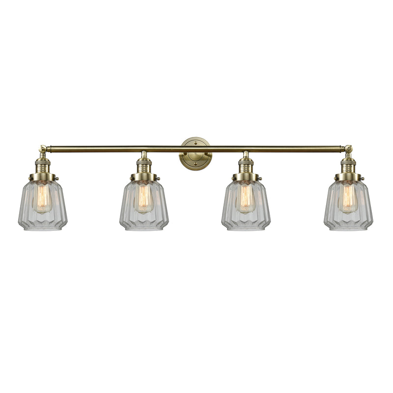 Chatham Bath Vanity Light shown in the Antique Brass finish with a Clear shade