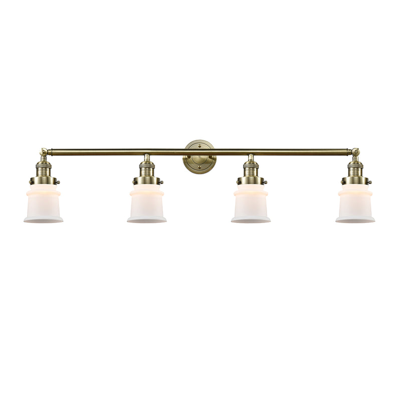 Canton Bath Vanity Light shown in the Antique Brass finish with a Matte White shade