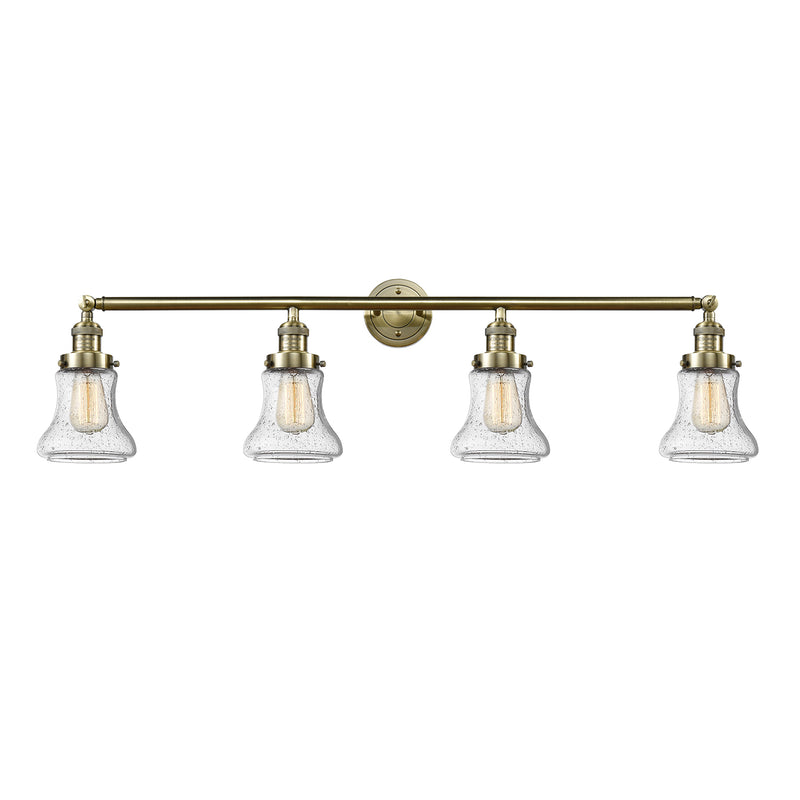 Bellmont Bath Vanity Light shown in the Antique Brass finish with a Seedy shade