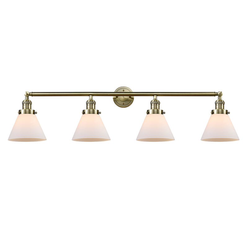 Cone Bath Vanity Light shown in the Antique Brass finish with a Matte White shade