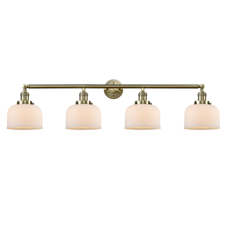 Bell Bath Vanity Light shown in the Antique Brass finish with a Matte White shade