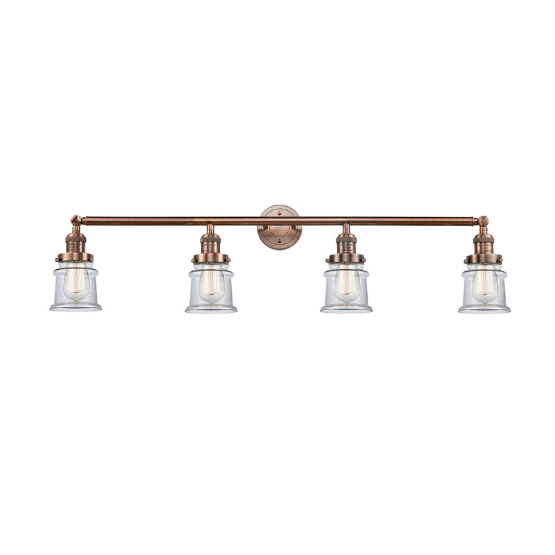 Canton Bath Vanity Light shown in the Antique Copper finish with a Clear shade