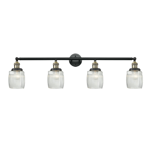 Colton Bath Vanity Light shown in the Black Antique Brass finish with a Clear Halophane shade