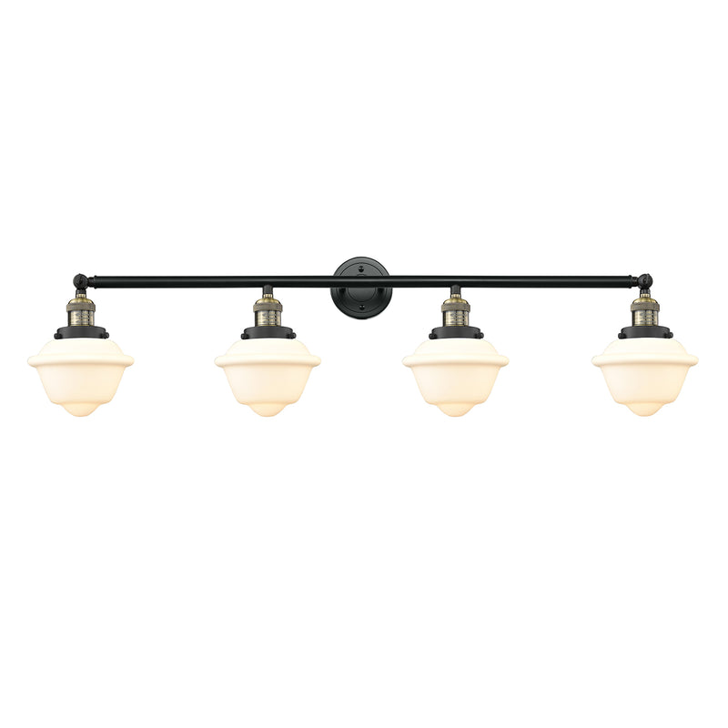 Oxford Bath Vanity Light shown in the Black Antique Brass finish with a Matte White shade