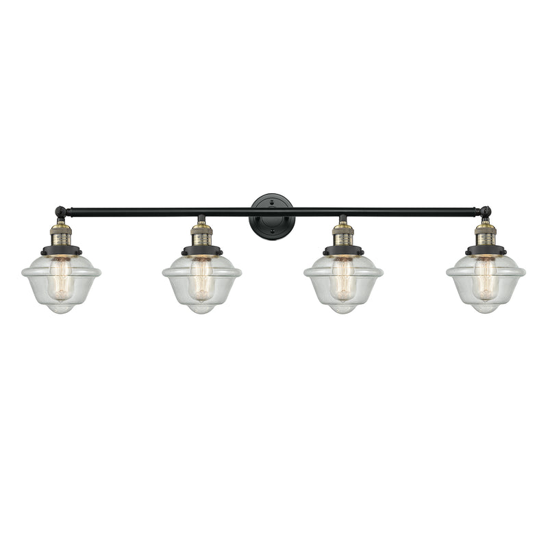 Oxford Bath Vanity Light shown in the Black Antique Brass finish with a Seedy shade