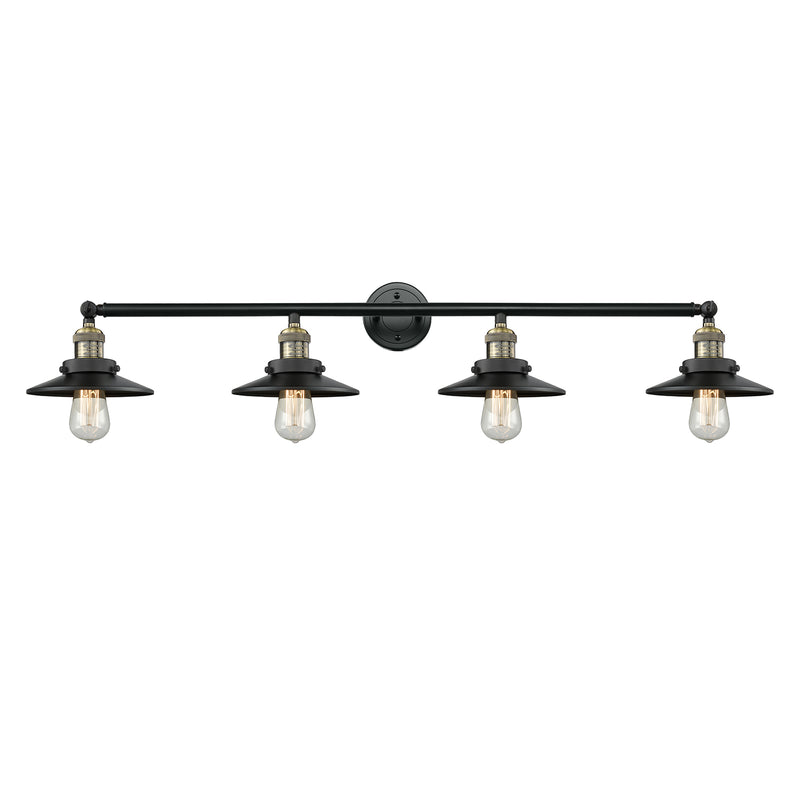 Railroad Bath Vanity Light shown in the Black Antique Brass finish with a Matte Black shade