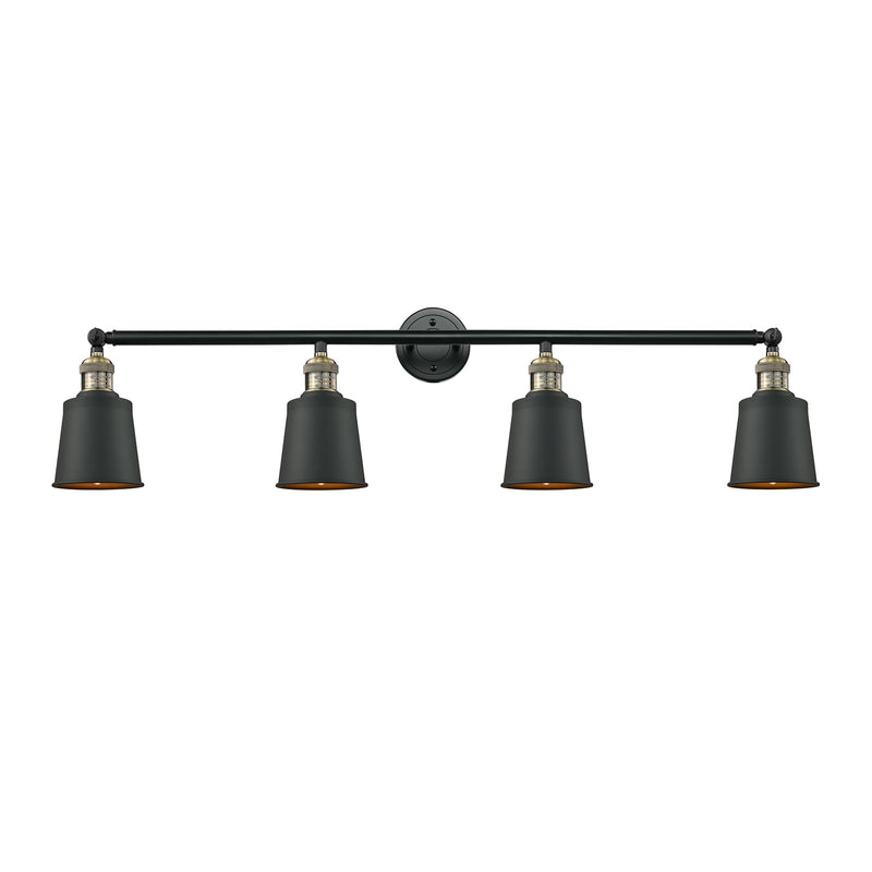 Addison Bath Vanity Light shown in the Black Antique Brass finish with a Matte Black shade
