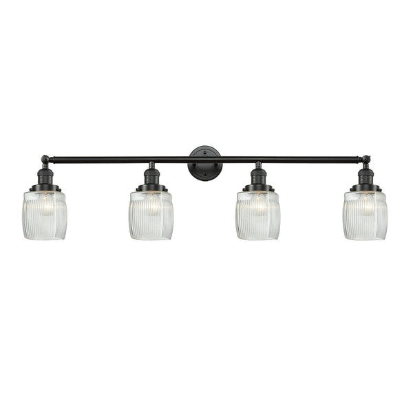 Colton Bath Vanity Light shown in the Oil Rubbed Bronze finish with a Clear Halophane shade