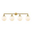 Beacon Bath Vanity Light shown in the Satin Gold finish with a Matte White shade