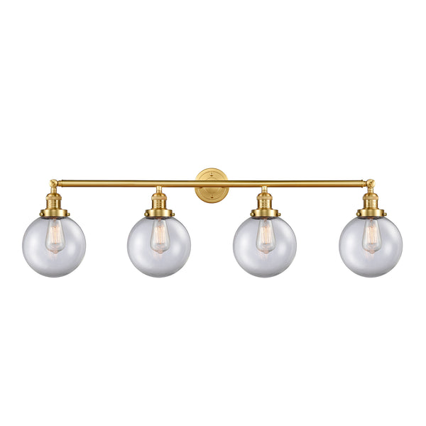 Beacon Bath Vanity Light shown in the Satin Gold finish with a Clear shade