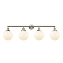 Beacon Bath Vanity Light shown in the Brushed Satin Nickel finish with a Matte White shade