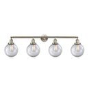 Beacon Bath Vanity Light shown in the Brushed Satin Nickel finish with a Clear shade