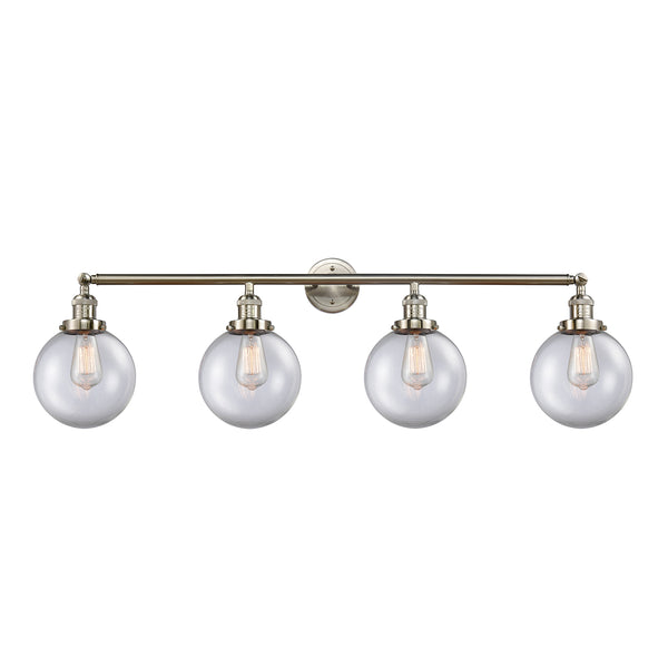 Beacon Bath Vanity Light shown in the Brushed Satin Nickel finish with a Clear shade