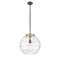 Deco Swirl Pendant shown in the Black Antique Brass finish with a Clear shade