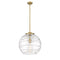 Deco Swirl Pendant shown in the Brushed Brass finish with a Clear shade