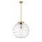 Deco Swirl Pendant shown in the Brushed Brass finish with a Clear shade