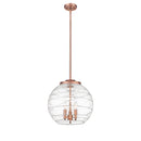 Deco Swirl Pendant shown in the Antique Copper finish with a Clear shade