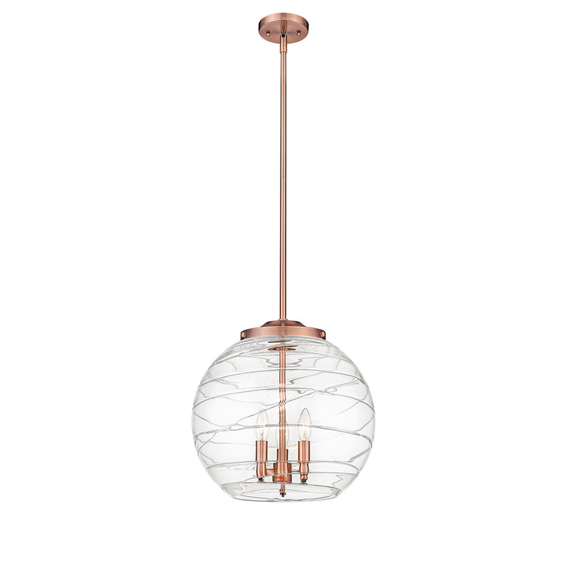 Deco Swirl Pendant shown in the Antique Copper finish with a Clear shade