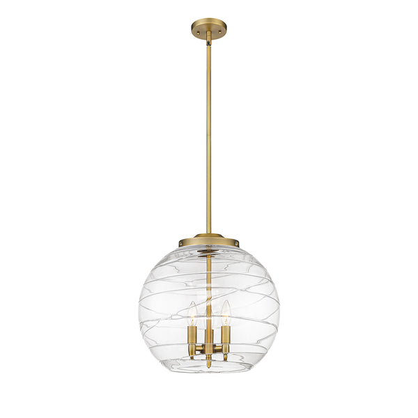 Deco Swirl Pendant shown in the Brushed Brass finish with a Clear shade