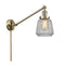 Chatham Swing Arm shown in the Antique Brass finish with a Clear shade