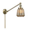 Chatham Swing Arm shown in the Antique Brass finish with a Mercury shade