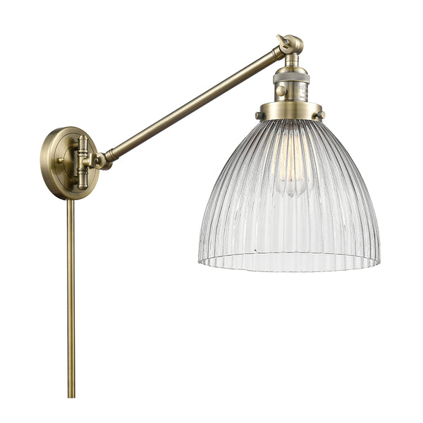 Seneca Falls Swing Arm shown in the Antique Brass finish with a Clear Halophane shade