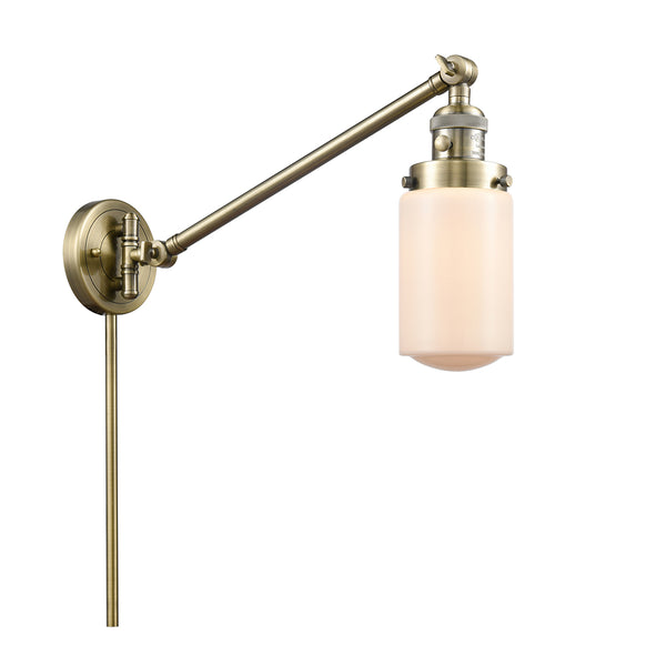 Dover Swing Arm shown in the Antique Brass finish with a Matte White shade