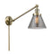 Cone Swing Arm shown in the Antique Brass finish with a Plated Smoke shade