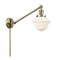 Oxford Swing Arm shown in the Antique Brass finish with a Matte White shade